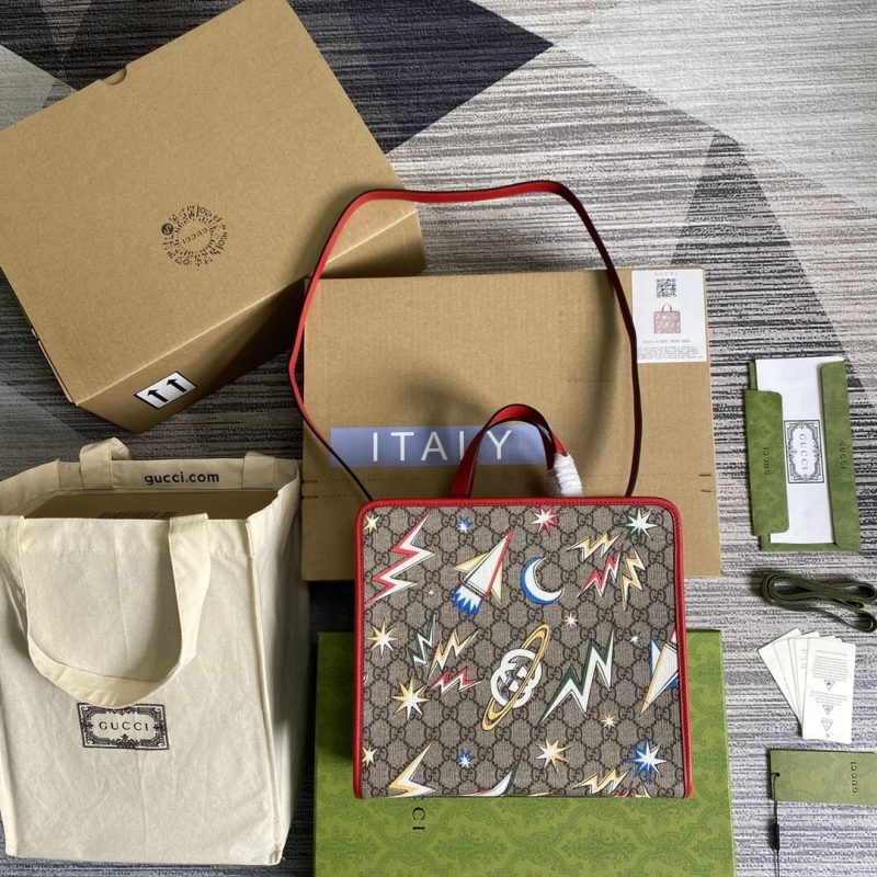 G*u*i shopping bags